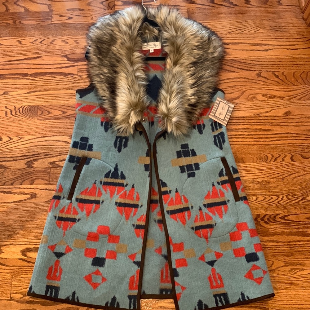 Tasha Polizzi faux fur sleeelss jacket